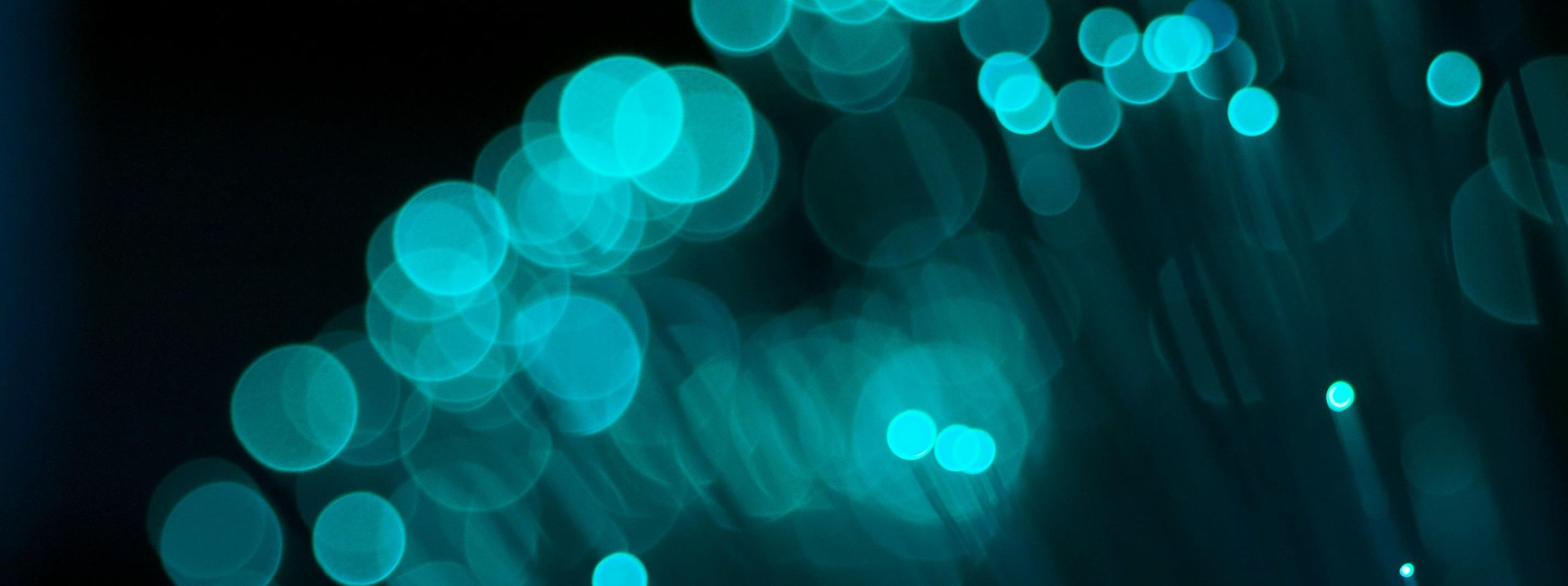 Blue lights representing connection. Discover the role of DE&I in cultivating an inclusive culture and connected workforce at b2b integrated marketing agencies.