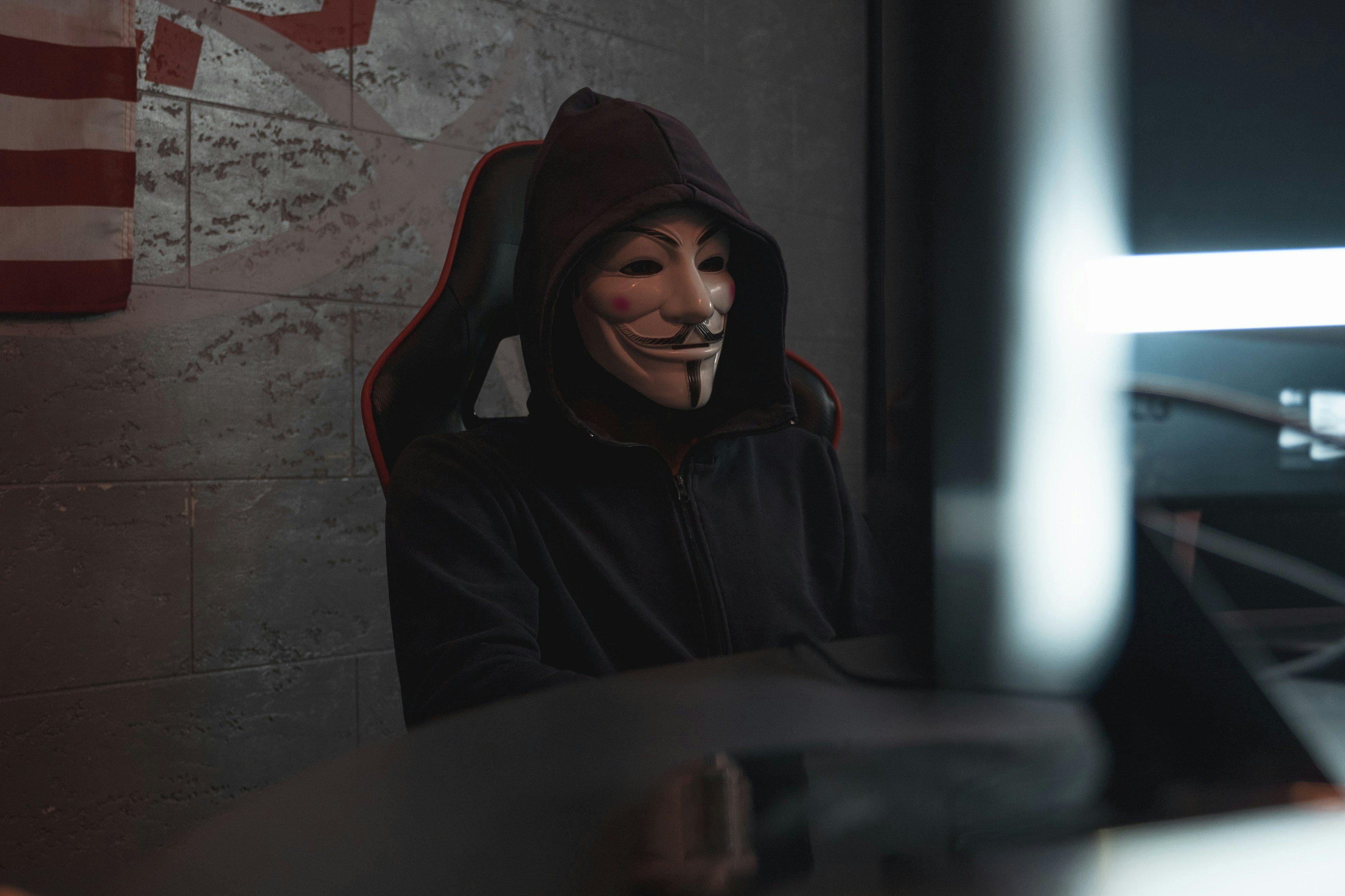 hacker spreading cyberthreats and FUD