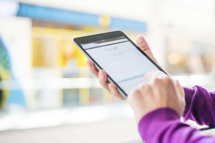 person holding phone working on inbound marketing program