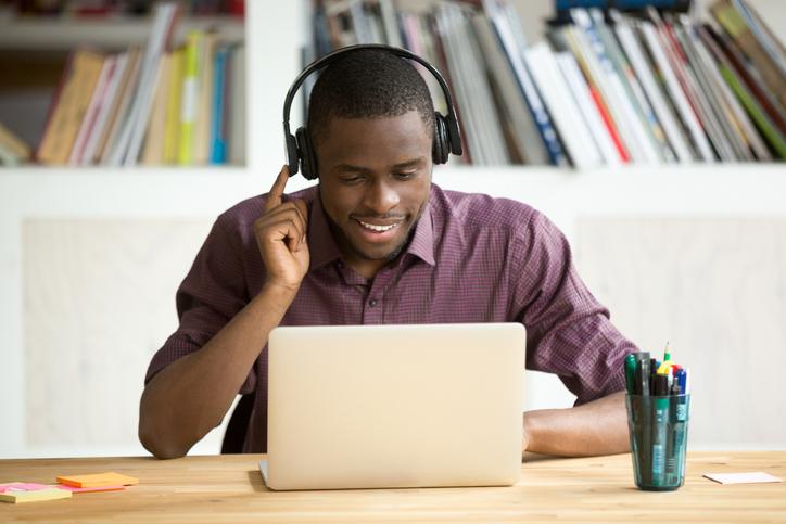 person sitting at desk on a zoom interview